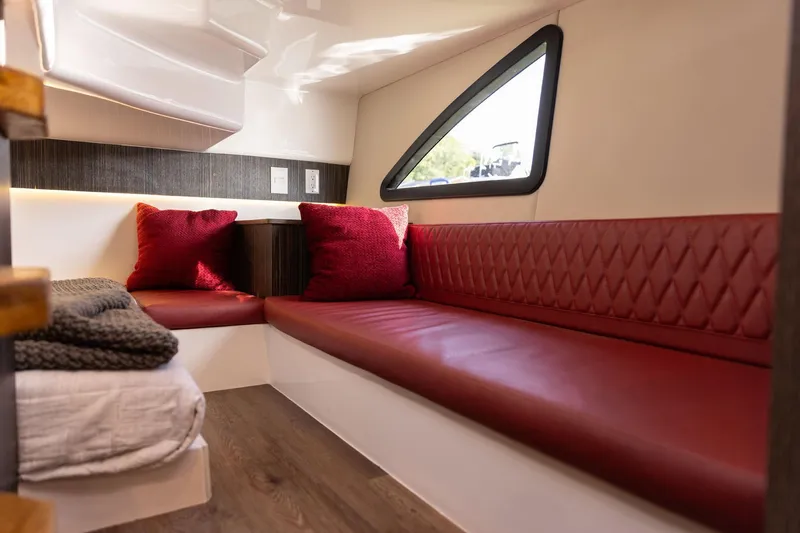 Slide: The Image of Luxurious interior of 2026 Hanover 387 with red seating and modern design. - 17