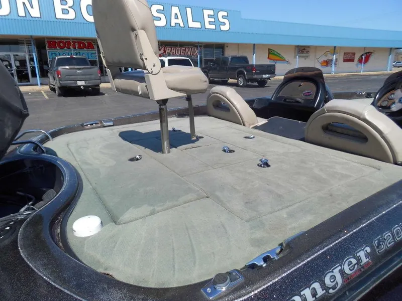 Slide: The Image of 2000 Ranger 520DVX Comanche boat at a boat sales lot. - 8