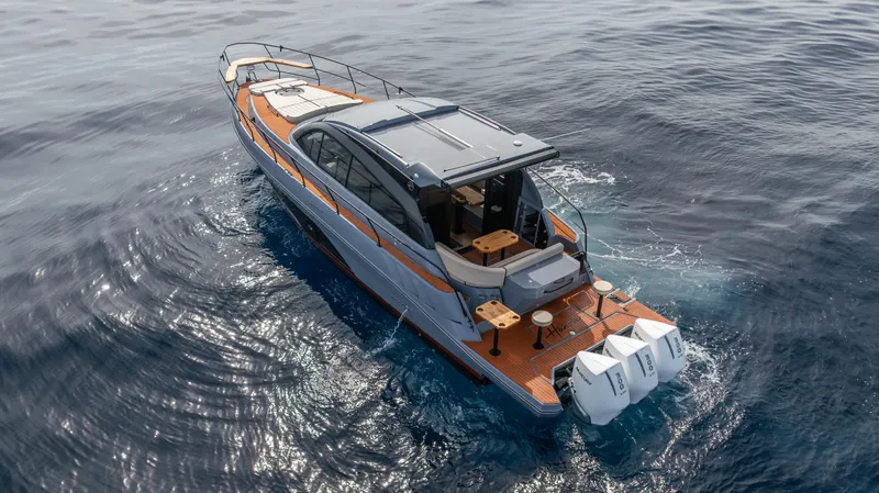 Slide: The Image of Luxury Hanover 415 yacht cruising on open water, 2025 model. - 11