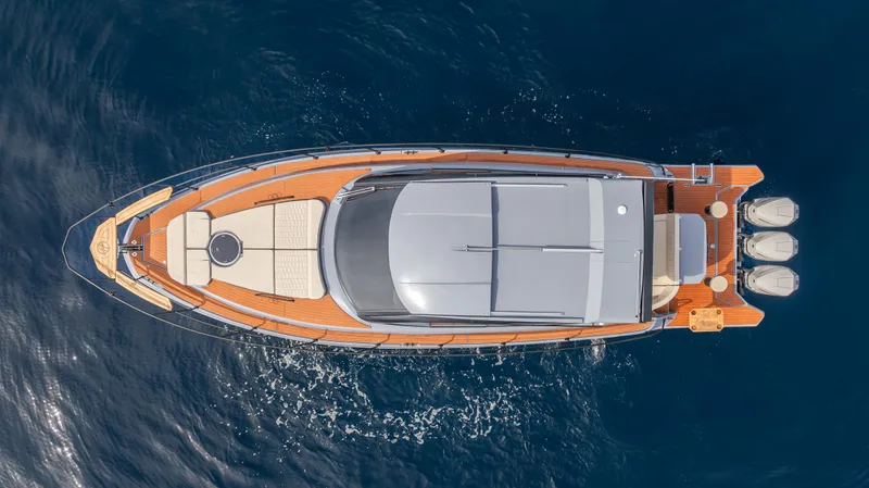 Slide: The Image of Aerial view of 2025 Hanover 415 yacht on deep blue water. - 14
