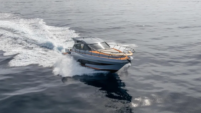 Slide: The Image of Hanover 415 yacht cruising on open water, 2025 model. - 18