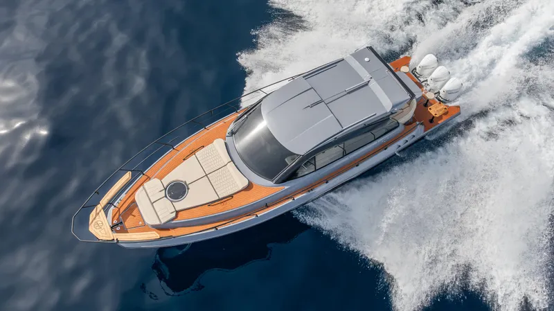 Slide: The Image of 2025 Hanover 415 yacht cruising on open water, top view. - 23