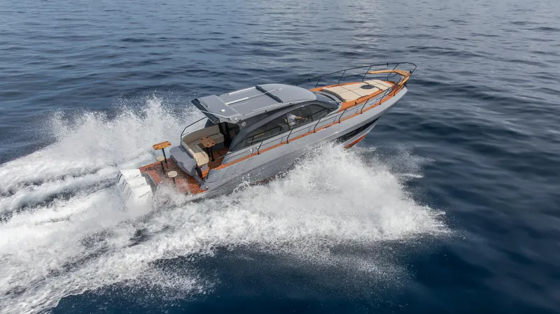 Slide: The Image of 2025 Hanover 415 luxury yacht cruising on open water. - 26