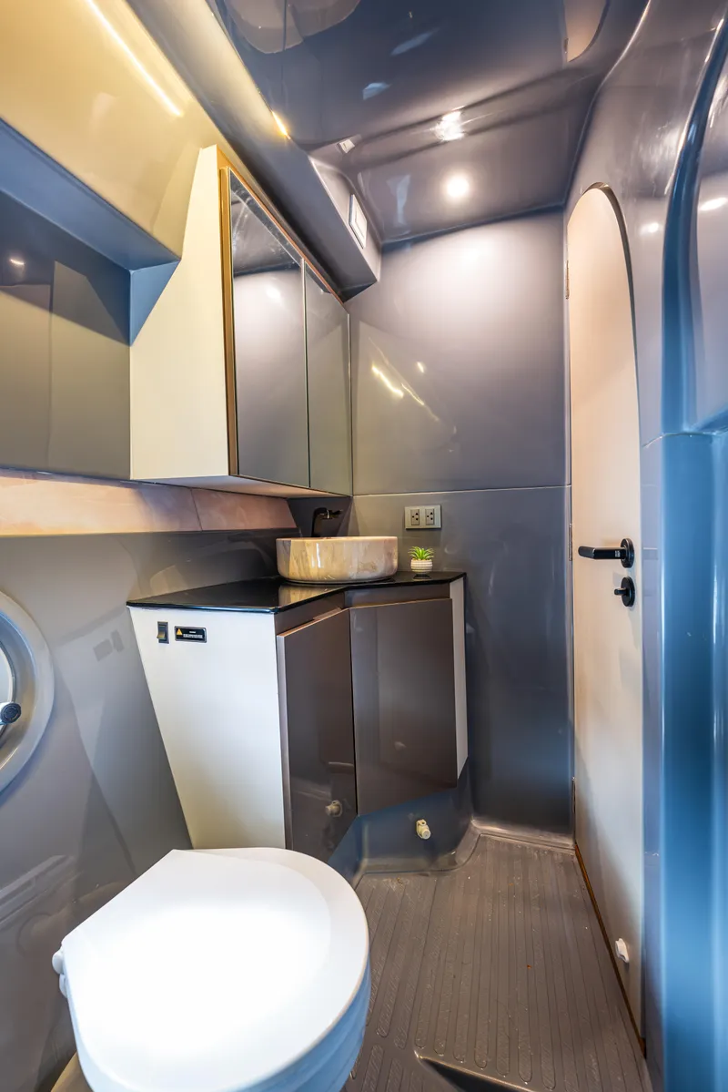 Slide: The Image of Modern bathroom interior in Hanover 415, 2025 model, featuring sleek design and compact fixtures. - 37