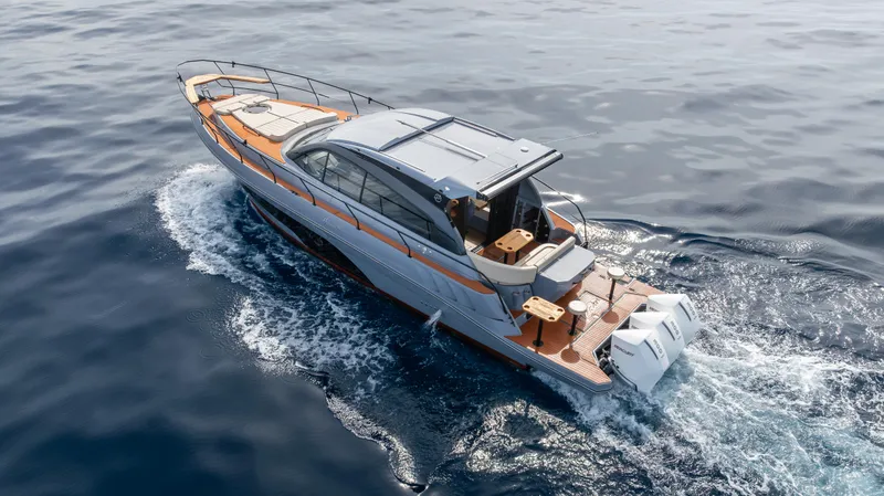 Slide: The Image of Luxury Hanover 415 yacht cruising on open water, 2025 model. - 7
