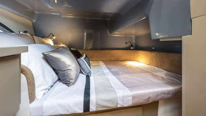 Slide: The Image of Luxurious interior of 2025 Hanover 415 with cozy bedding and ambient lighting. - 11
