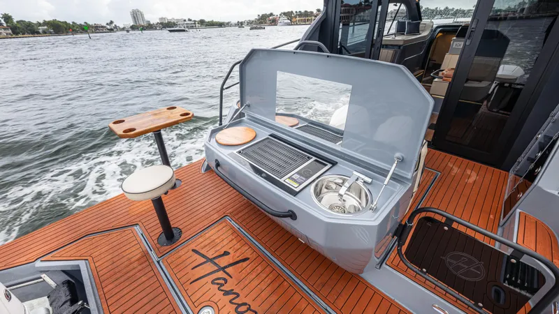 Slide: The Image of Hanover 415 boat with grill and sink, 2026 model. - 32