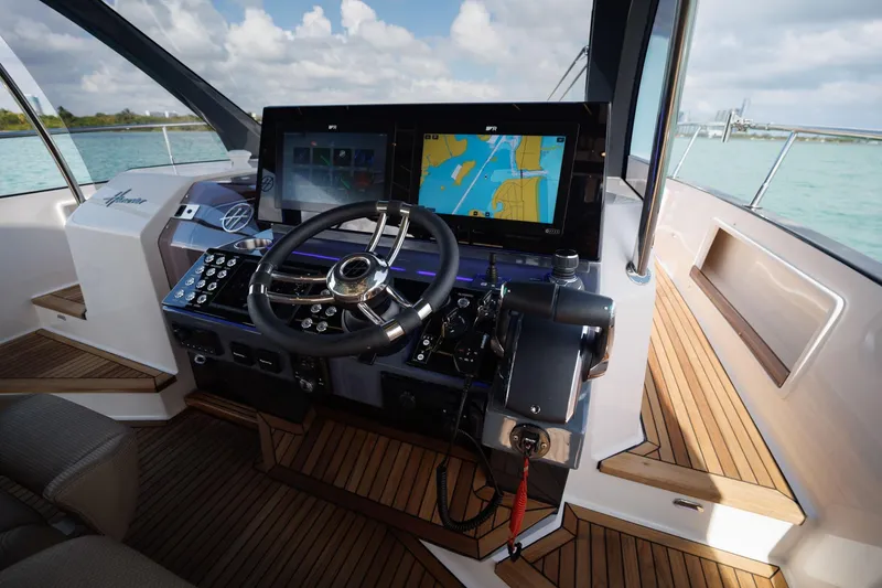 Slide: The Image of Helm of 2026 Hanover 447 yacht with advanced navigation system and sleek design. - 34