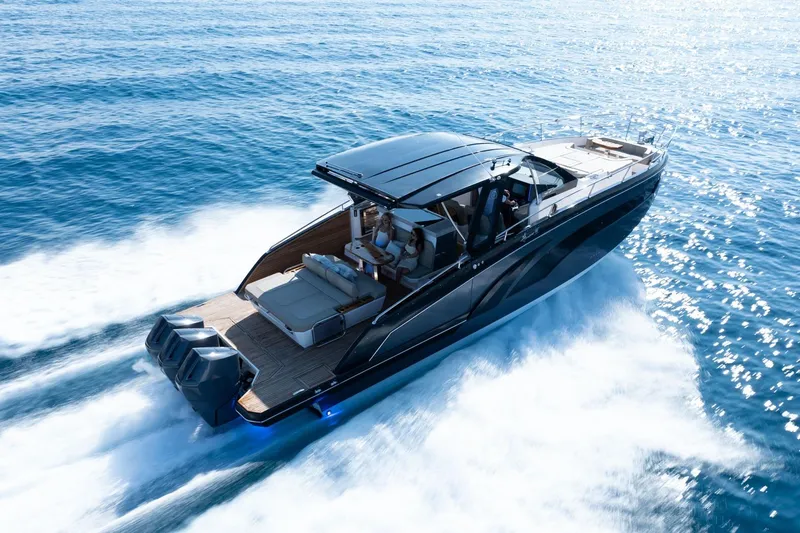 Slide: The Image of Luxurious 2026 Hanover 447 yacht cruising swiftly on open blue waters. - 5