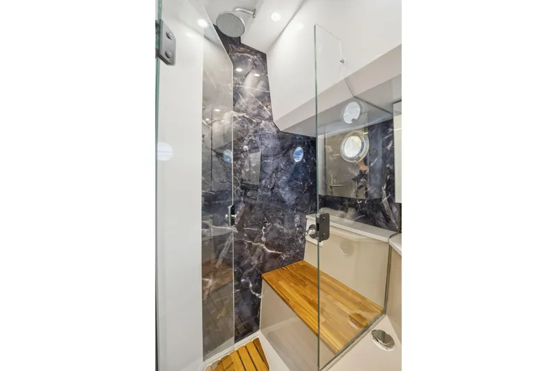 Slide: The Image of Luxurious Hanover 447 yacht bathroom with glass shower and elegant marble accents, 2026 model. - 58