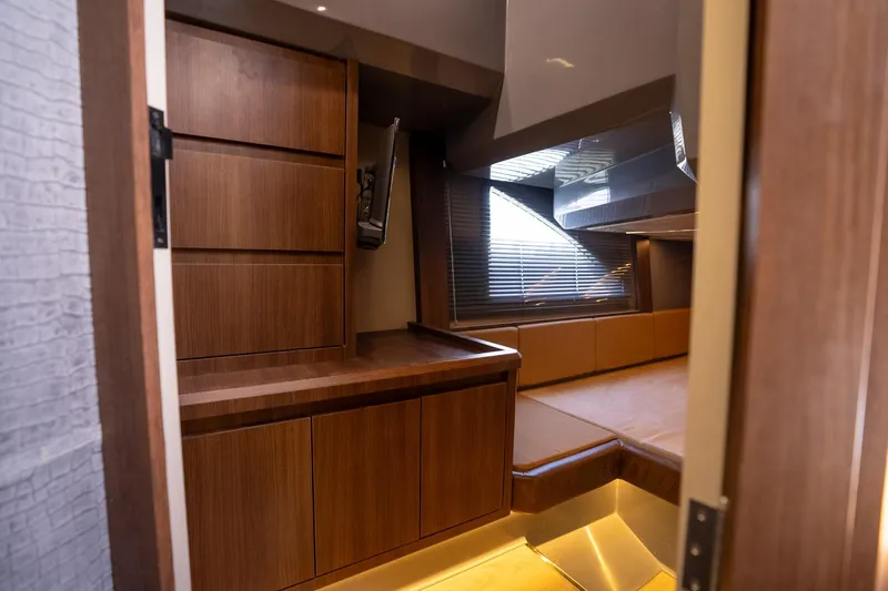 Slide: The Image of Luxurious interior of 2026 Hanover 447 yacht with sleek wooden cabinetry and modern design. - 16