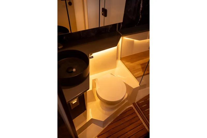 Slide: The Image of Luxurious bathroom in 2026 Hanover 447 model yacht with modern lighting and sleek design. - 20