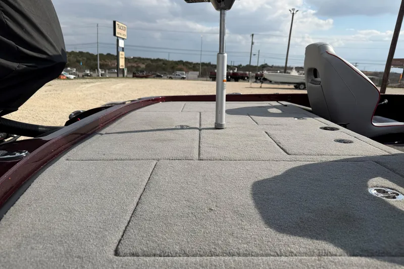 Slide: The Image of 2024 Nitro Z21 XL Pro boat deck with seating and storage compartments. - 5