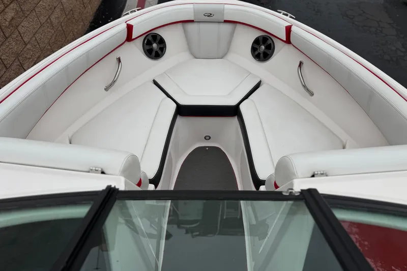 Slide: The Image of 2017 Regal 2000 ESX Bowrider interior with white seating and red accents. - 13