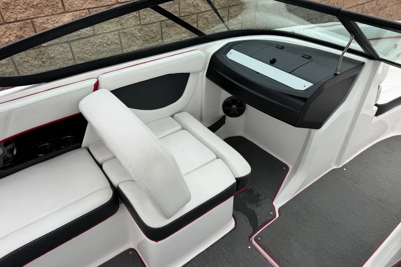 Slide: The Image of 2017 Regal 2000 ESX Bowrider interior with white seating and black accents. - 21