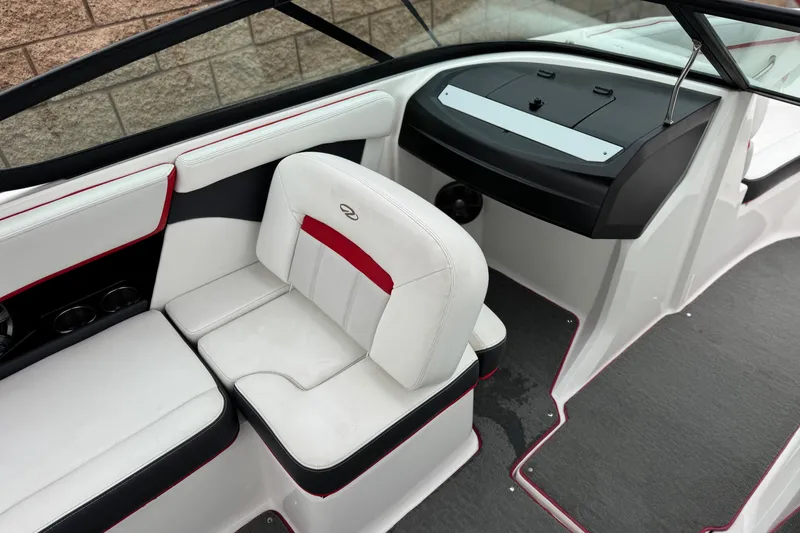 Slide: The Image of 2017 Regal 2000 ESX Bowrider interior with white and red seating, modern dashboard. - 22