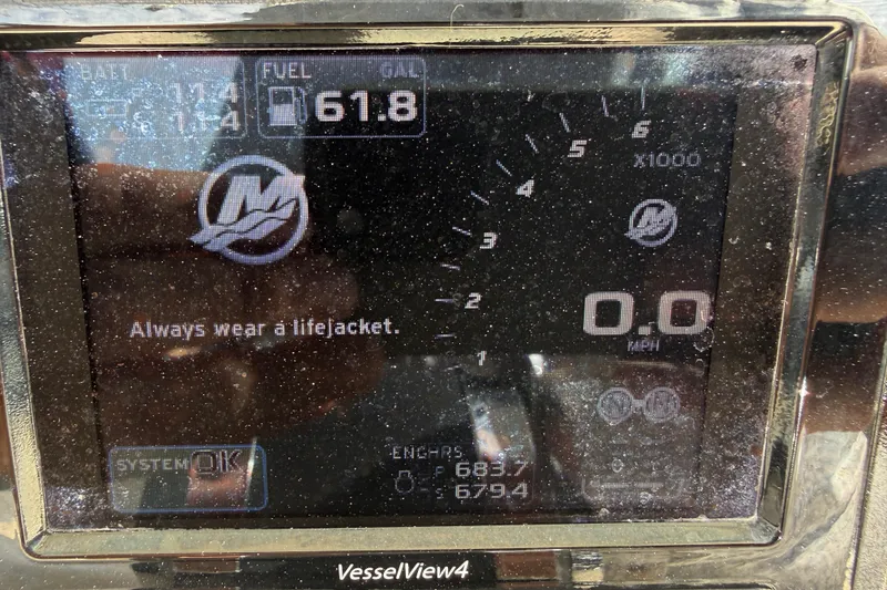 Slide: The Image of Dashboard display of a 2018 Boston Whaler 270 Dauntless, showing fuel level and safety reminder. - 15