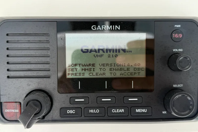 Slide: The Image of Garmin VHF 210 radio on 2018 Boston Whaler 270 Dauntless, displaying software version 4.40. - 18
