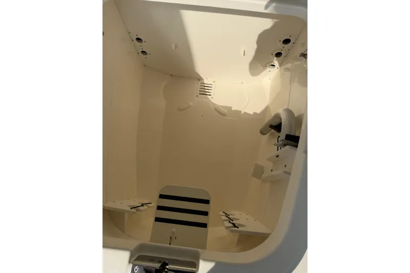 Slide: The Image of 2018 Boston Whaler 270 Dauntless interior storage compartment, showcasing spacious design and utility. - 29