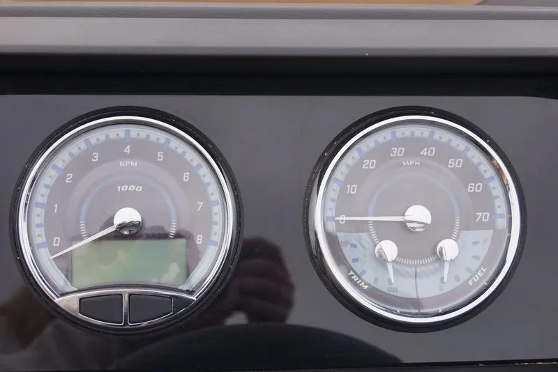 Slide: The Image of Dashboard gauges of 2026 Avalon Catalina Versatile Rear Bench boat, showing RPM and speed. - 24