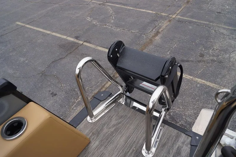 Slide: The Image of 2026 Avalon Catalina Versatile Rear Bench boat with stainless steel ladder and cup holder. - 26