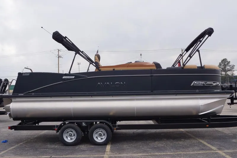 Slide: The Image of 2026 Avalon Catalina Versatile Rear Bench pontoon boat on trailer, side view. - 3
