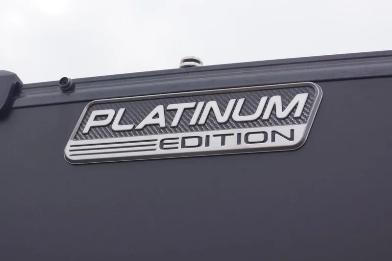 Slide: The Image of Platinum Edition badge on 2026 Avalon Catalina Versatile Rear Bench boat. - 4