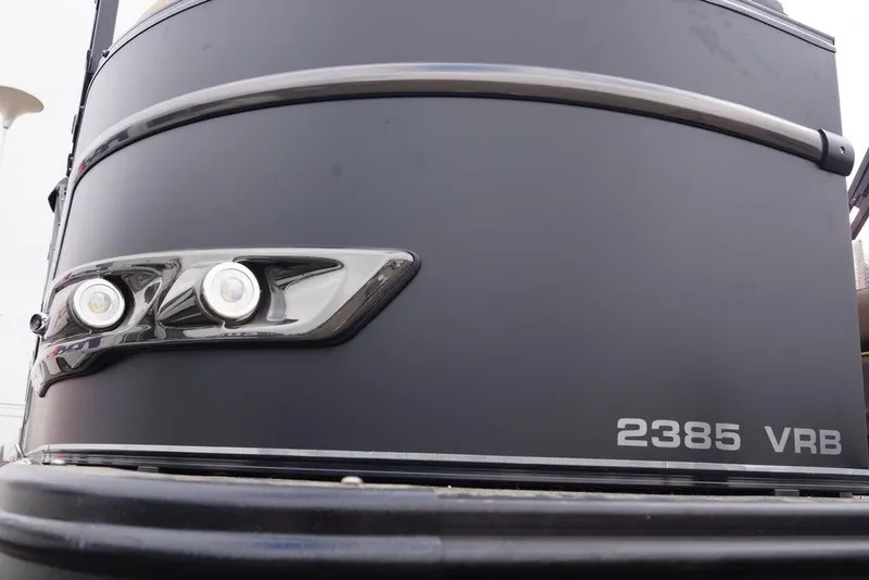 Slide: The Image of 2026 Avalon Catalina Versatile Rear Bench boat, close-up of sleek design and model number. - 9