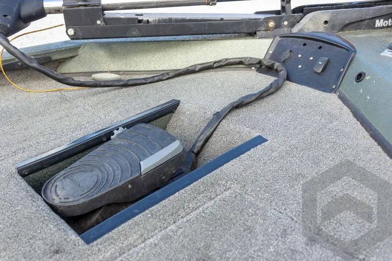 Slide: The Image of Foot pedal control on 2015 Xpress H17 boat deck with textured surface. - 16