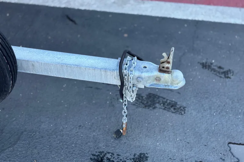 Slide: The Image of Trailer hitch with chain lock for 2000 Boston Whaler 13 Sport boat. - 20