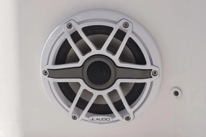 Slide: The Image of JL Audio speaker on 2026 Tidewater 2410 Bay Max boat, close-up view. - 22