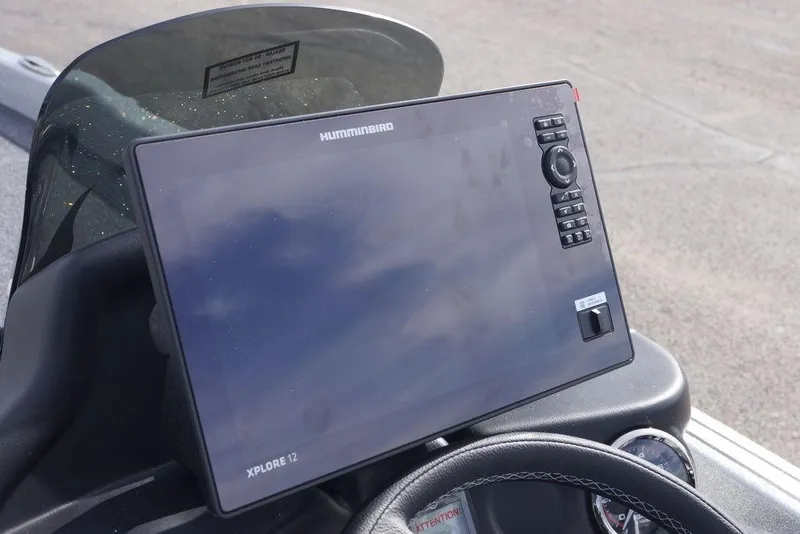 Slide: The Image of Humminbird Xplore 12 fishfinder on 2026 Phoenix 721 ZXL boat dashboard. - 12