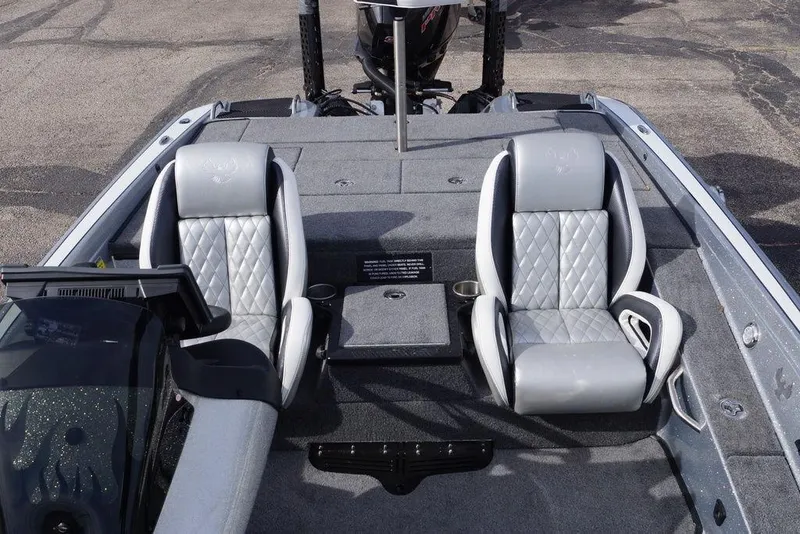 Slide: The Image of 2026 Phoenix 721 ZXL boat interior with two gray quilted seats and a central console. - 17