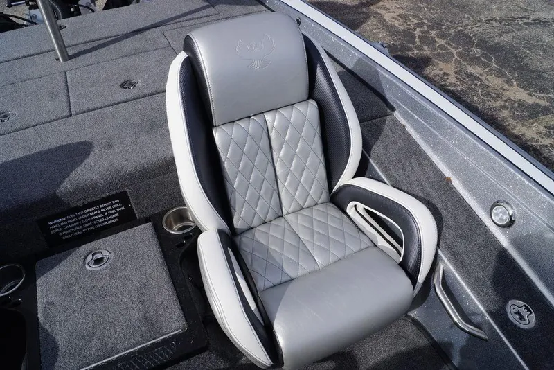 Slide: The Image of Luxury seating in 2026 Phoenix 721 ZXL boat, featuring quilted gray upholstery. - 18