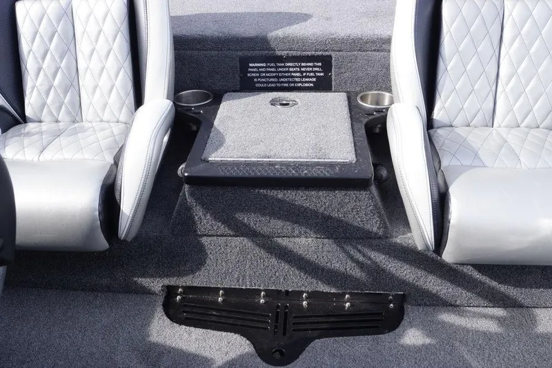 Slide: The Image of 2026 Phoenix 721 ZXL boat interior with diamond-stitched seats and center console. - 19