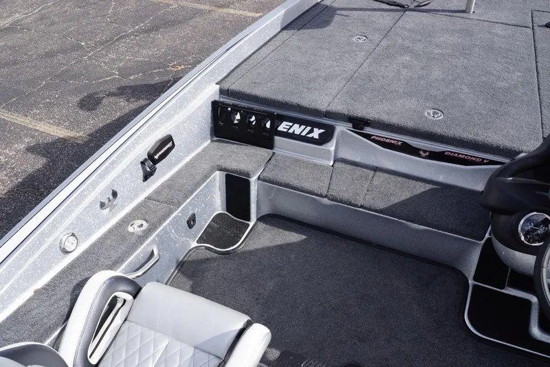 Slide: The Image of Interior of a 2026 Phoenix 721 ZXL boat, featuring sleek seating and control panel. - 20