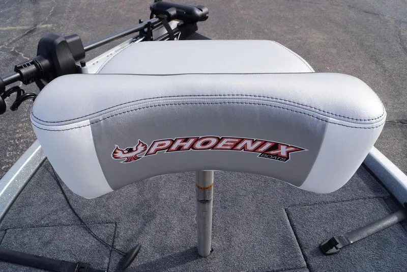 Slide: The Image of 2026 Phoenix 721 ZXL boat seat with logo, featuring gray and white upholstery. - 25