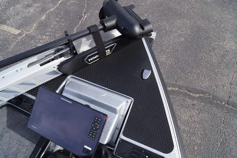 Slide: The Image of 2026 Phoenix 721 ZXL boat deck with Minn Kota trolling motor and Humminbird fish finder. - 26