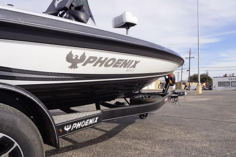 Slide: The Image of 2026 Phoenix 721 ZXL boat on trailer in parking lot. - 4