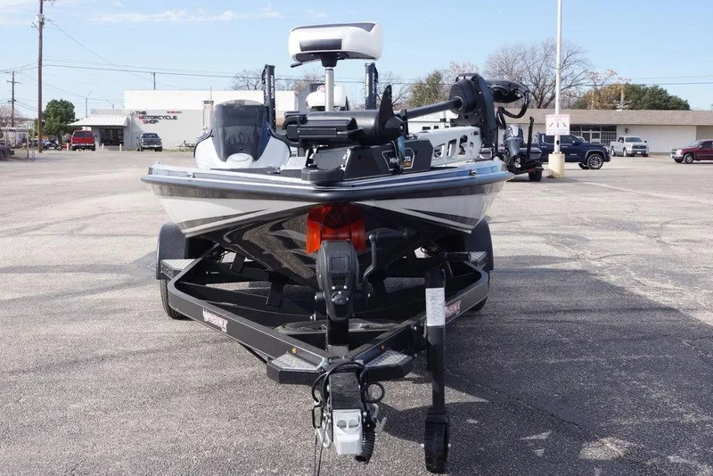 Slide: The Image of 2026 Phoenix 721 ZXL boat on trailer in parking lot, front view. - 6