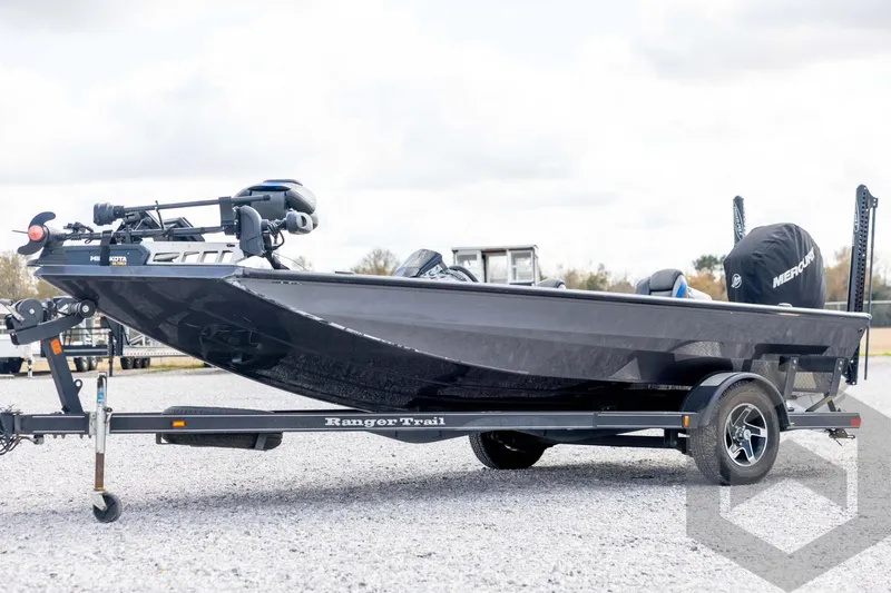 The Image of 2020 Ranger RT188P boat on trailer, black exterior, parked outdoors. - 1