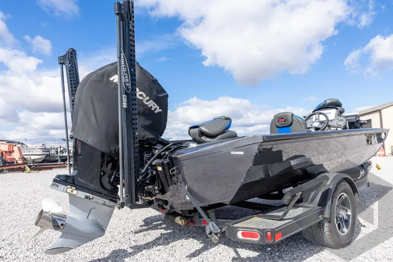 Slide: The Image of 2020 Ranger RT188P boat with Mercury engine on trailer, under a blue sky. - 16