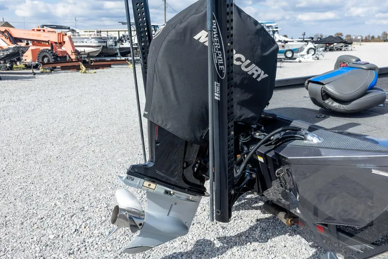 Slide: The Image of 2020 Ranger RT188P boat with Mercury engine and Power-Pole, parked on gravel lot. - 19