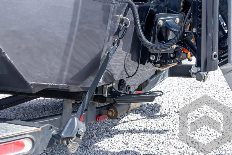 Slide: The Image of 2020 Ranger RT188P boat trailer hitch and components on gravel surface. - 25