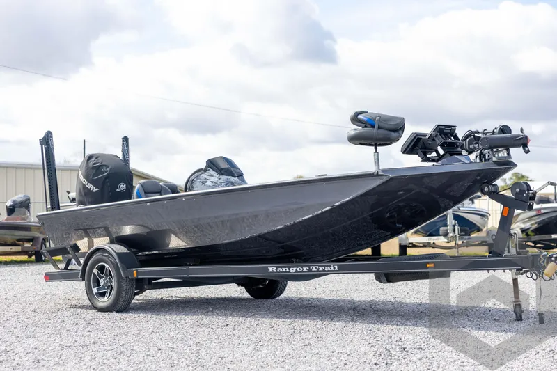 Slide: The Image of 2020 Ranger RT188P fishing boat on trailer, parked outdoors under cloudy sky. - 3