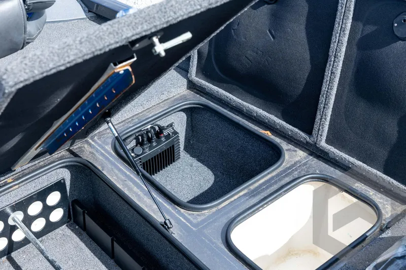 Slide: The Image of Open storage compartments in a 2020 Ranger RT188P boat, showcasing interior features. - 38