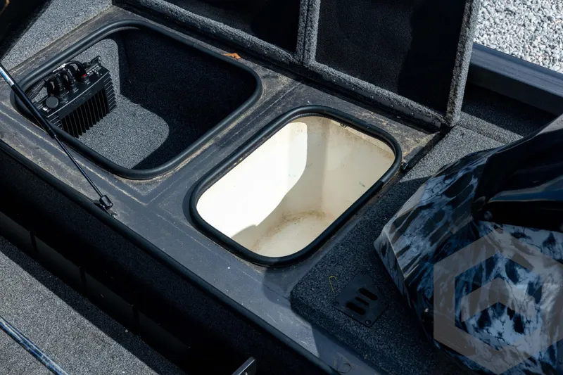 Slide: The Image of 2020 Ranger RT188P boat storage compartments with electronic equipment. - 39