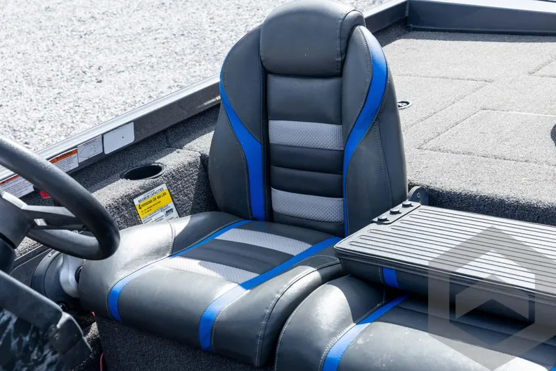 Slide: The Image of 2020 Ranger RT188P boat seat with blue and gray accents, featuring a steering wheel and control panel. - 42