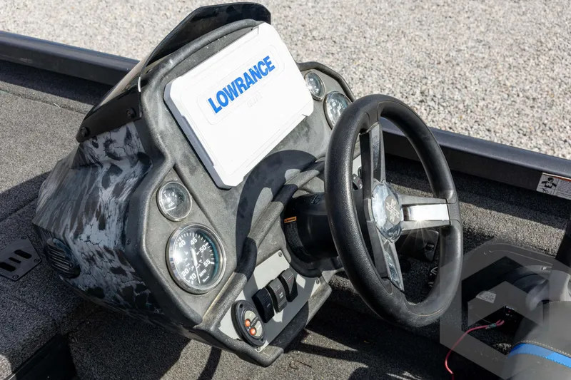 Slide: The Image of 2020 Ranger RT188P boat dashboard with Lowrance display and steering wheel. - 45