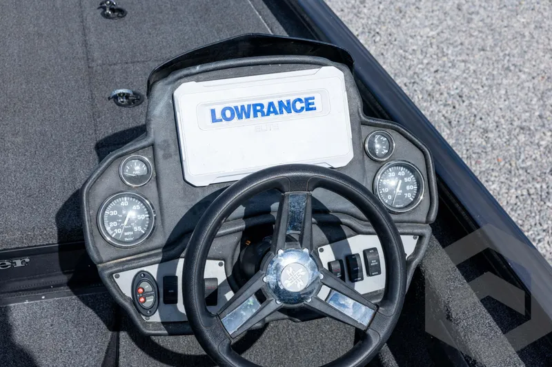 Slide: The Image of 2020 Ranger RT188P boat dashboard with Lowrance display and gauges. - 46